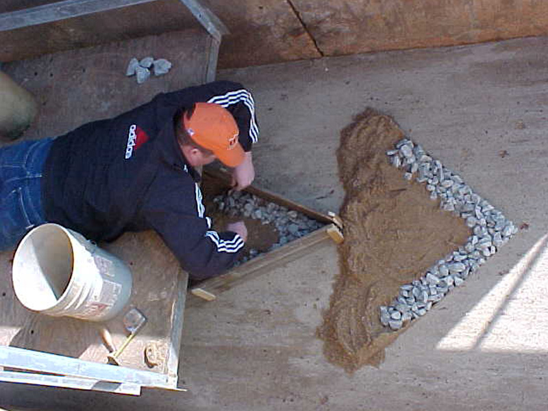 Students creating a flood design to lower flooding problems.