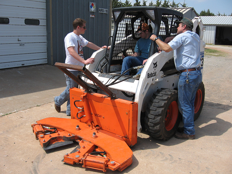 Students testing their tractor attachment