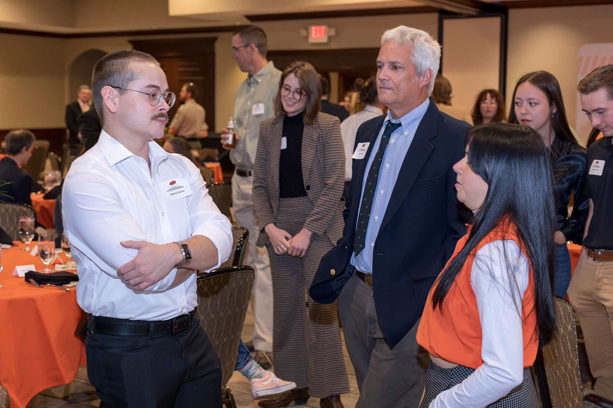 A group of people standing at the 2024 banquet.