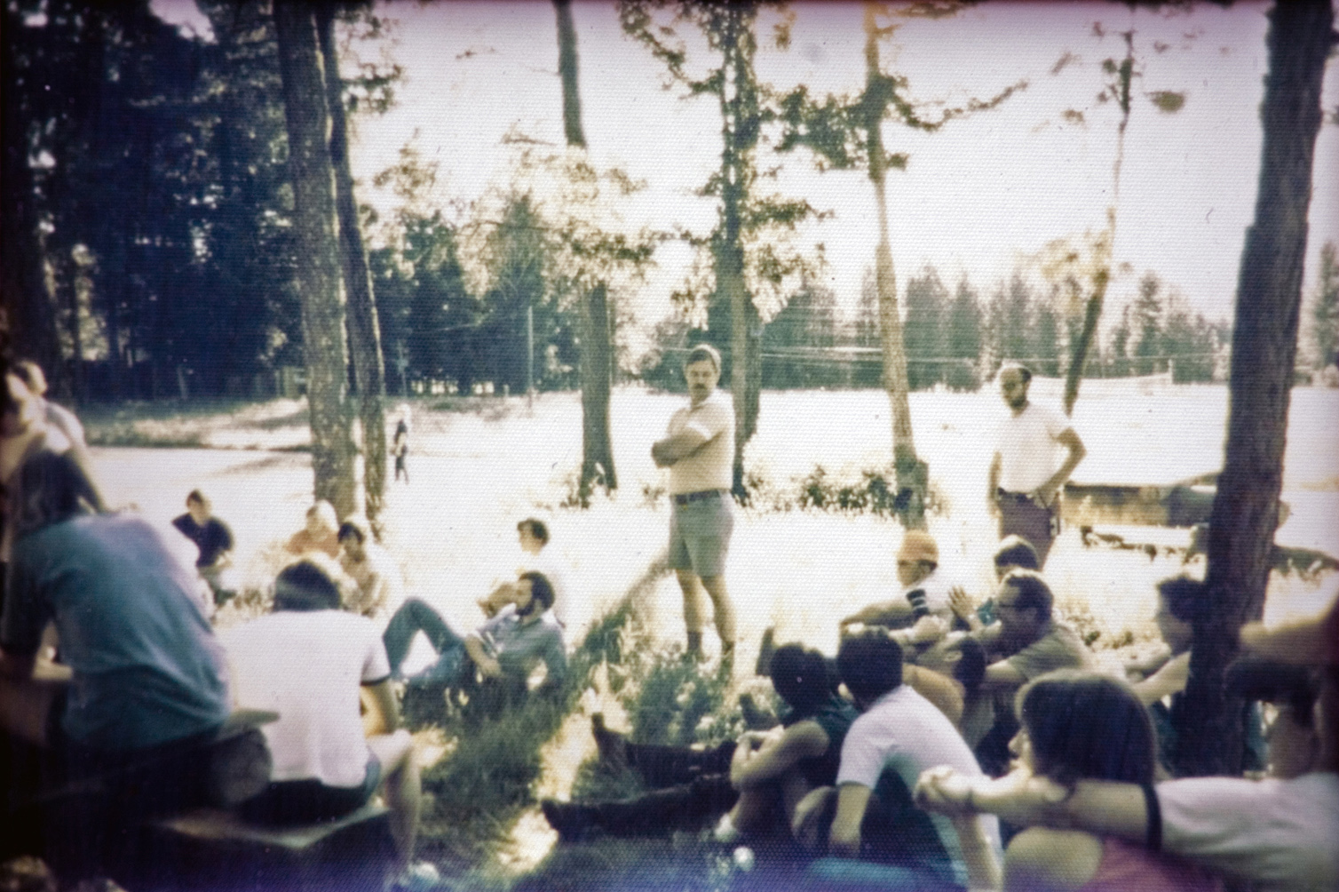 A group of students sitting outside.