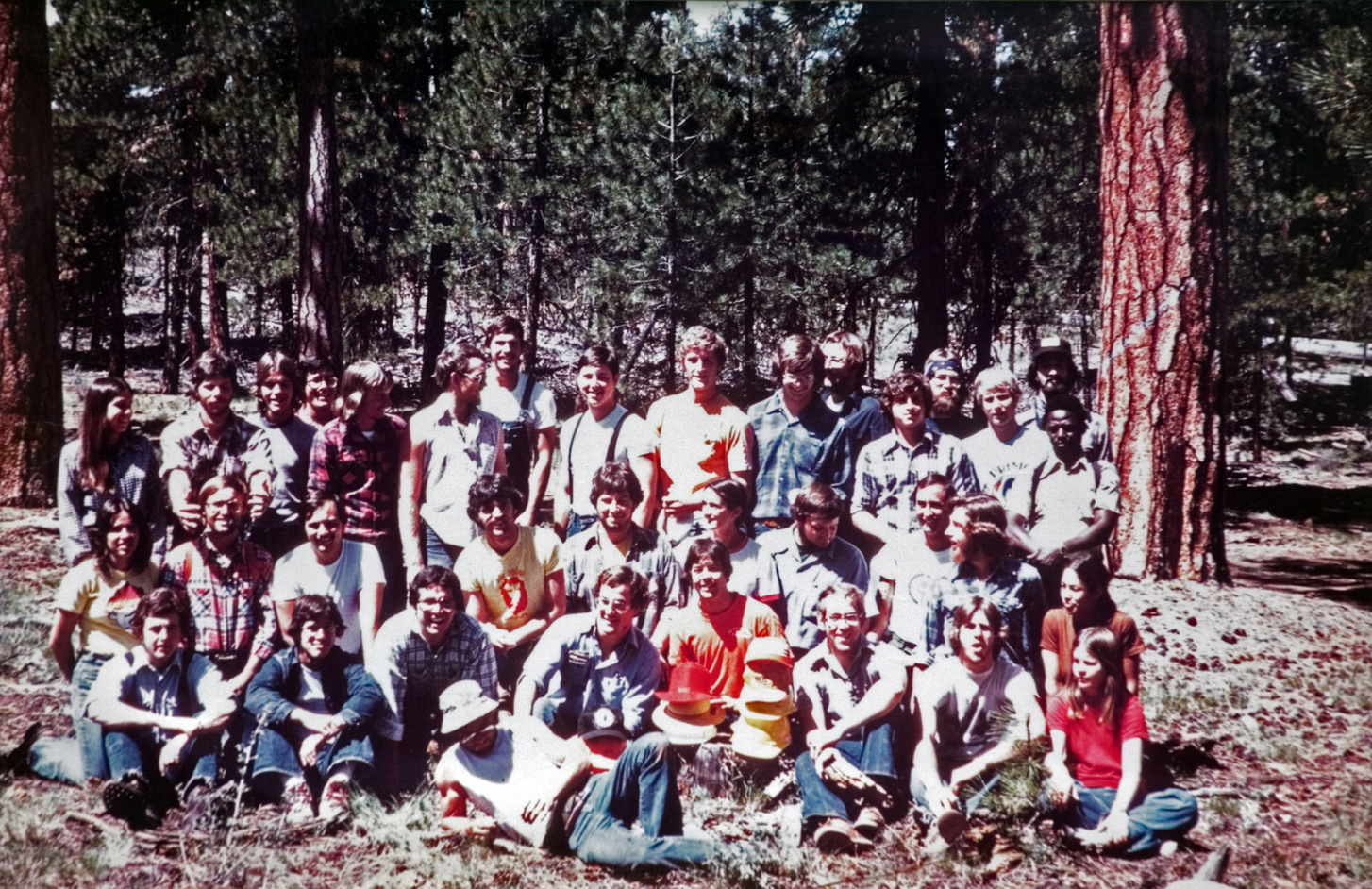 The camp group gathers outside for a photo.