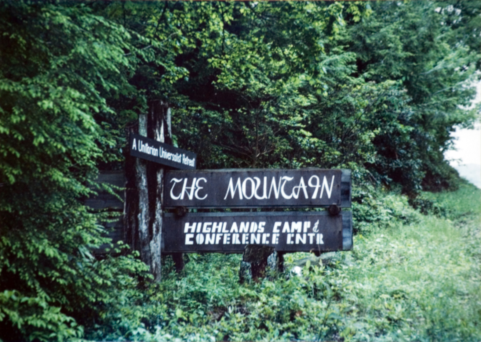A sign which says The Morigain Highlands Camp/Conference Center.