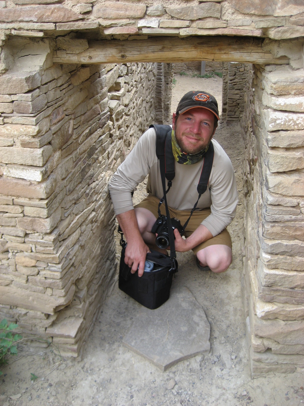 A participant posed under rock formation.