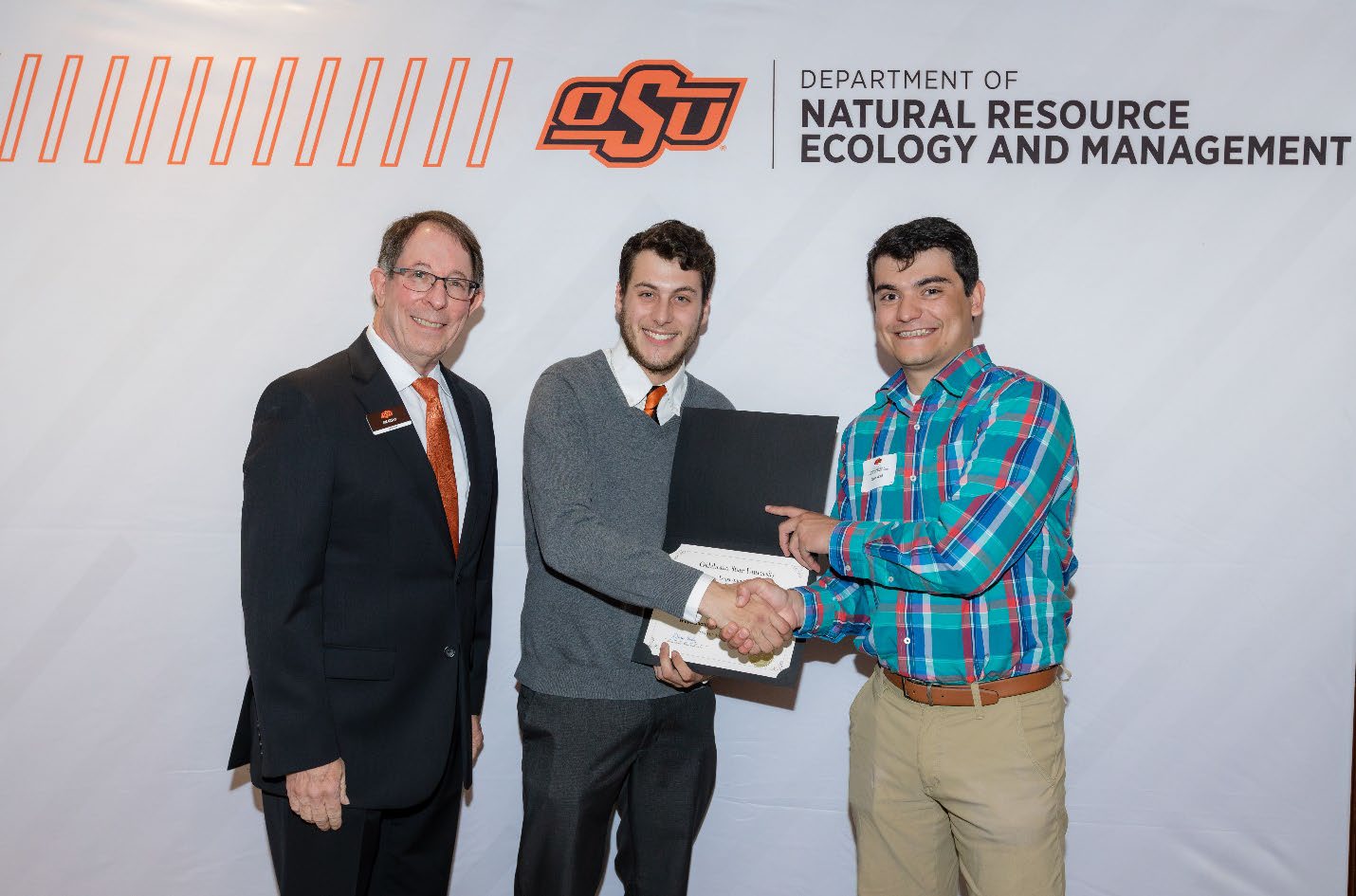 Austin and David with Jim Ansley accepting their Undergraduate Student Scholarship award.