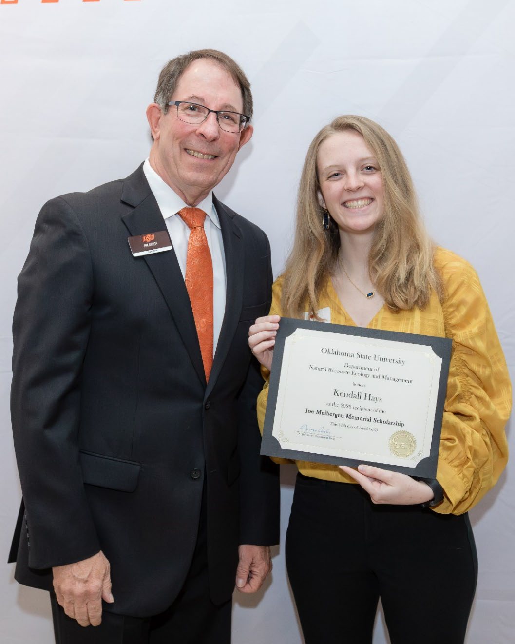 Kendall with Jim Ansley accepting her Undergraduate Student Scholarship award.