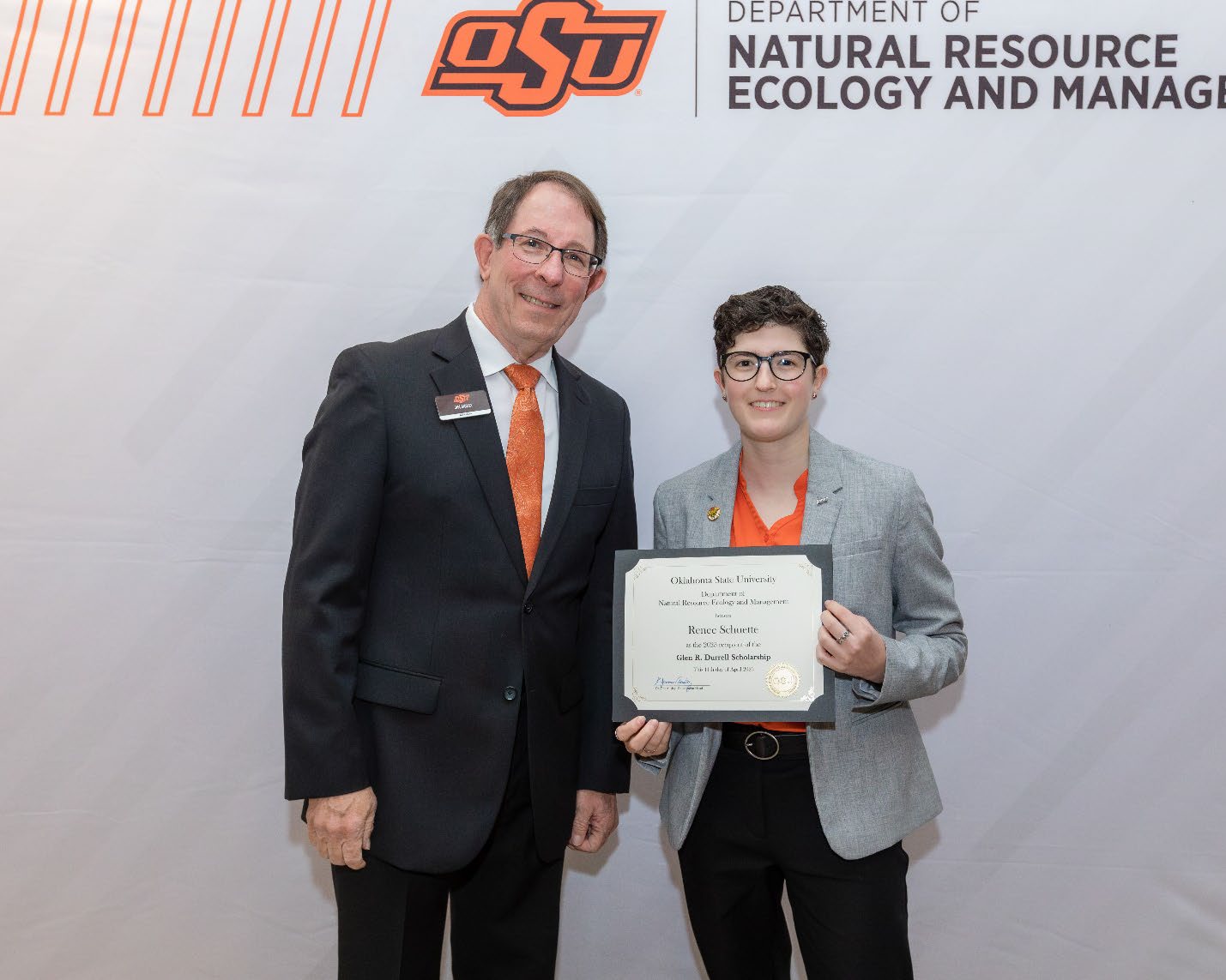 Renee Schuette with Jim Ansley accepting her Undergraduate Student Scholarship award.