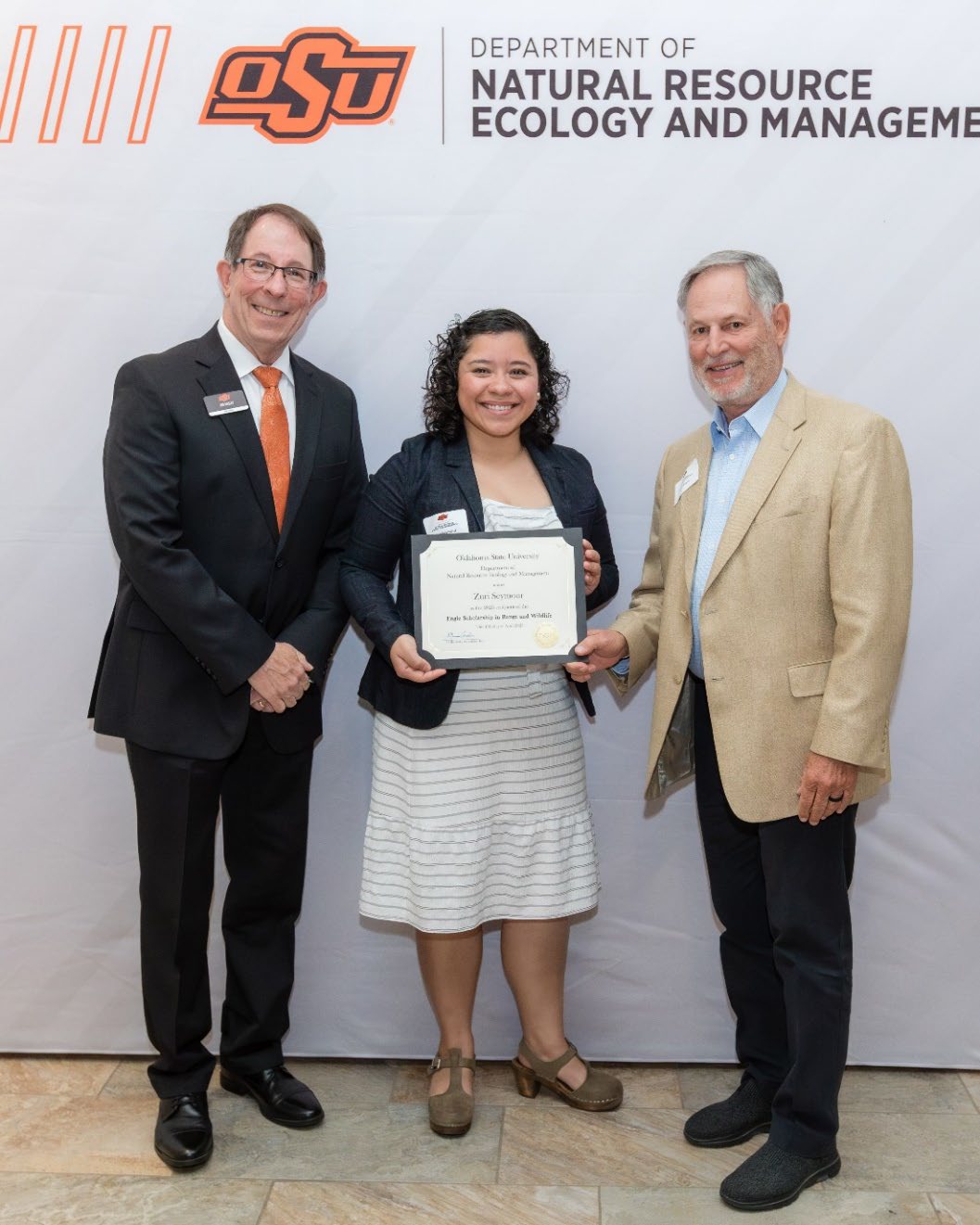 Zurisadai Seymour with Jim Ansley accepting her Undergraduate Student Scholarship award.