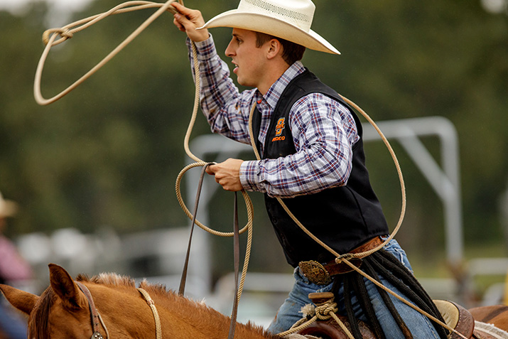 student calf roping