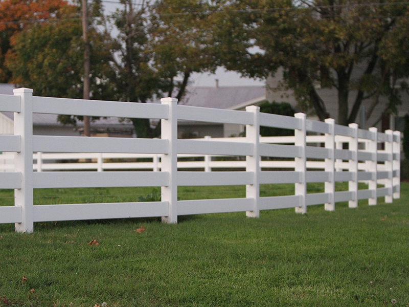 White vinyl split rail fencing