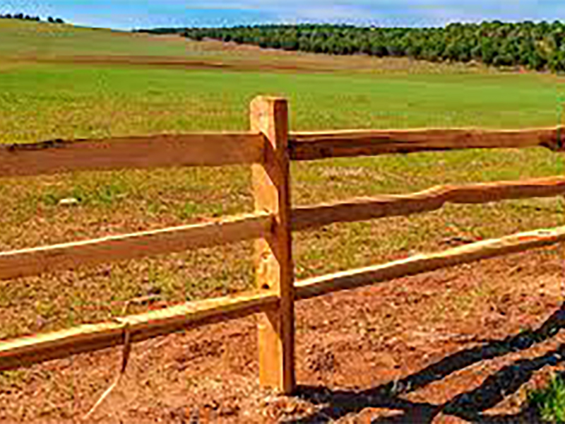 Wood split three rail fencing